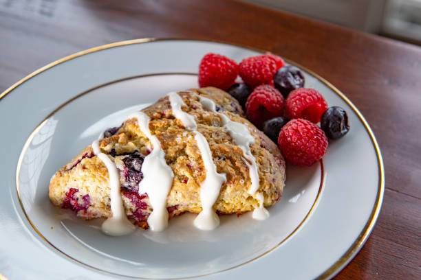 istock Freshly baked raspberry blueberry scones 1361372537