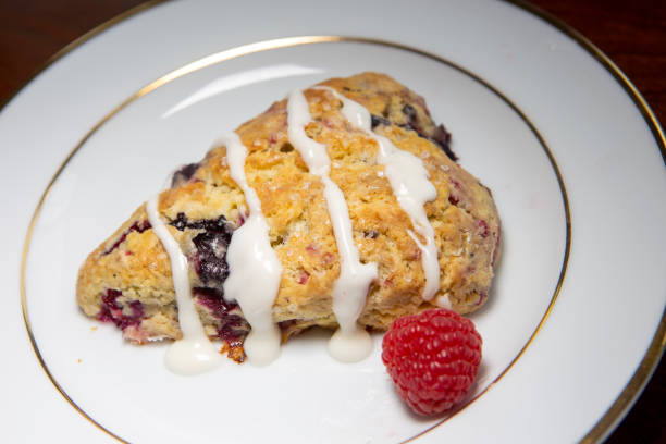 istock Freshly baked raspberry blueberry scones 1361372592