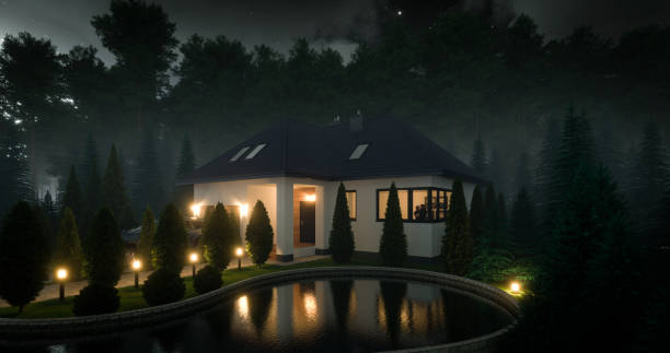 Digitally generated modern family villa/house with a small pond surrounded by conifer trees, at night.\n\nThe scene was created in Autodesk® 3ds Max 2022 with V-Ray 5 and rendered with photorealistic shaders and lighting in Chaos® Vantage with some post-production added.