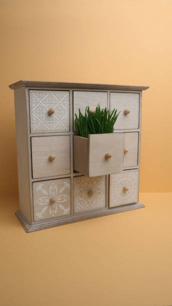 istock Green grass in a wooden box. 1361375684
