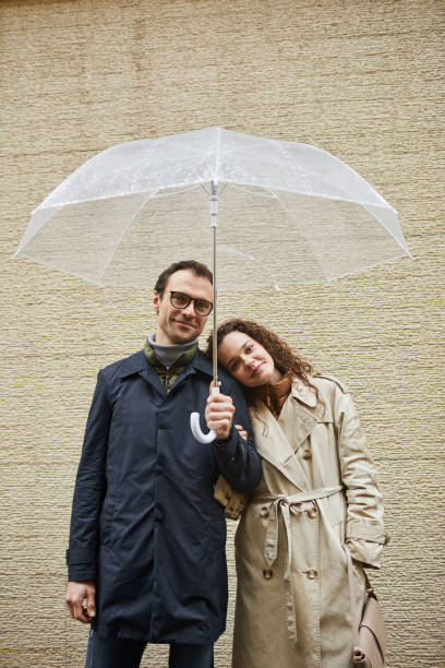 istock Lovely Couple under Umbrella 1361389721