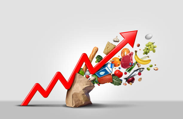 Rising Food Cost Rising food cost and grocery prices surging costs of supermarket groceries as an inflation financial crisis concept coming out of a paper bag shaped hit by a a finance graph arrow with 3D render elements. inflation stock pictures, royalty-free photos & images