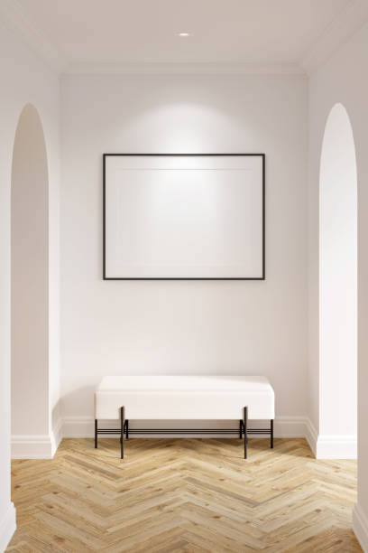 istock Bright classic hall with a blank illuminated horizontal poster above a white ottoman between two arches, parquet flooring, ceiling with recessed lights. Front view. 1361392135