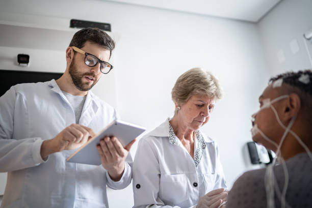 istock Doctors talking to the patient before polysomnography (sleep study) 1361394288