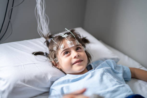istock Boy talking to the doctor before polysomnography (sleep study) 1361394612