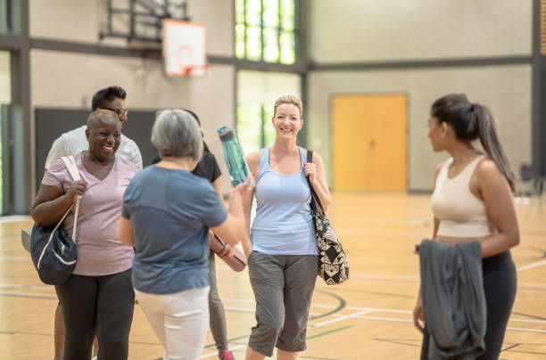 istock Fitness class goers get to know each other 1361395448