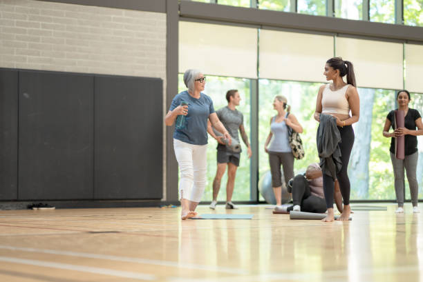 istock Fitness class goers get to know each other 1361395450