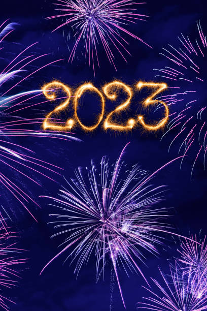 Sparkling New Year 2023 with fireworks stock photo