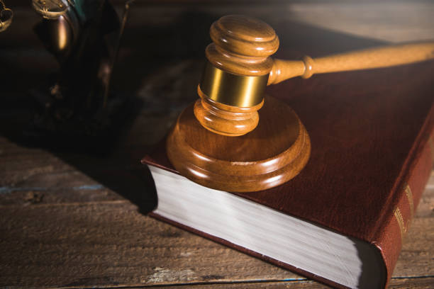 istock the judge's hammer on the book 1361398641