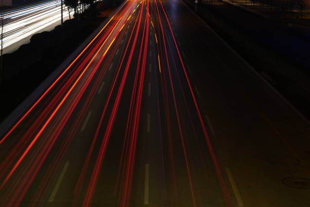 istock long exposure car lights. evening highway long exposure 1361399887