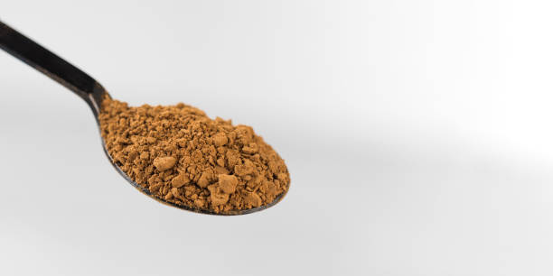 istock Small spoon with instant coffee granules. Copy space. Banner 1361399979