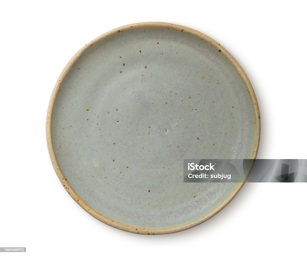 Pottery Plate Rustic green pottery plate Plate Stock Photo