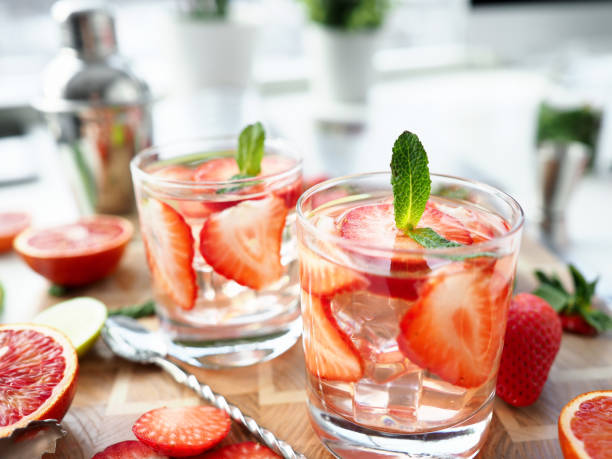 istock Glasses with alcoholic cocktails stand on table 1361401065