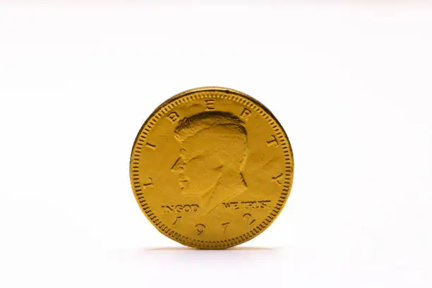One Gold Coin In White Background