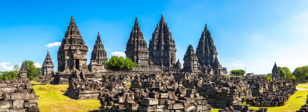 Prambanan temple in Yogyakarta Panorama of Prambanan temple near Yogyakarta city, Central Java, Indonesia central java province photos stock pictures, royalty-free photos & images