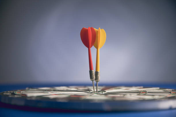 istock darts in the center of the target 1361403189