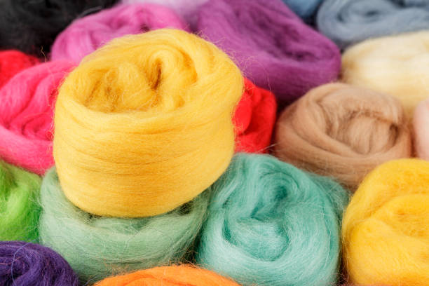 Skeins of wool, fibers, bright merino wool for crafts, selective stock photo