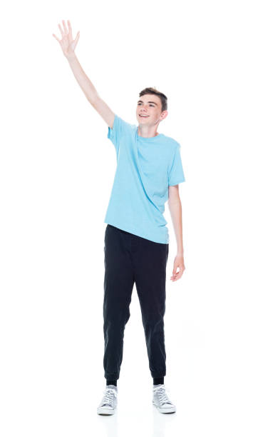 istock Caucasian male standing in front of white background 1361409719
