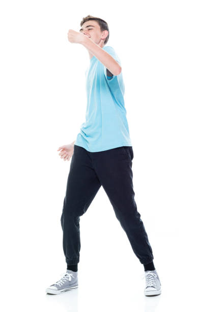 istock Caucasian young male standing in front of white background 1361409829
