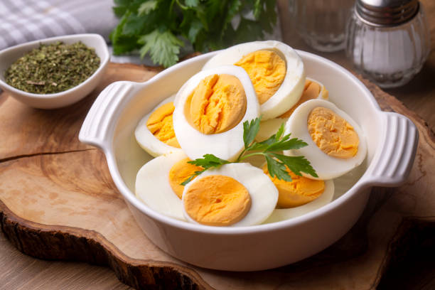 Boiled sliced egg, food photo