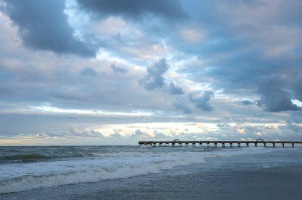 istock Beautiful cloudy day on Florida beach. 1361411883