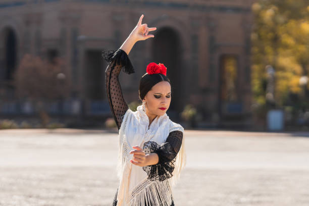 istock Spanish woman dancing flamenco outdoors 1361412708