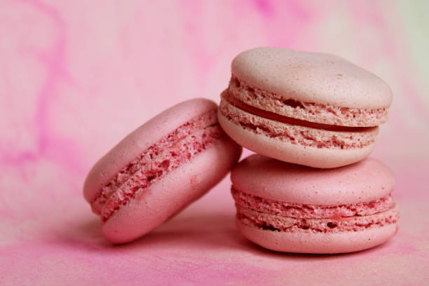 istock Beautiful template with pink macaroon on pink background for design. 1361415691