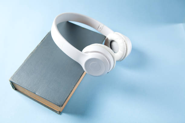 istock audiobook concept. books and headphones 1361417143