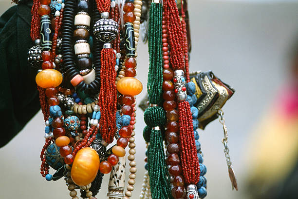 A tibetean woman is selling the typical jewellery at the small village of Darchen in Western Tibet. Darchen is the starting/ending point of the \