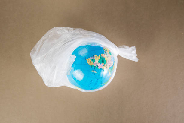 istock globe in a trash bag. ecological disaster concept. 1361419249