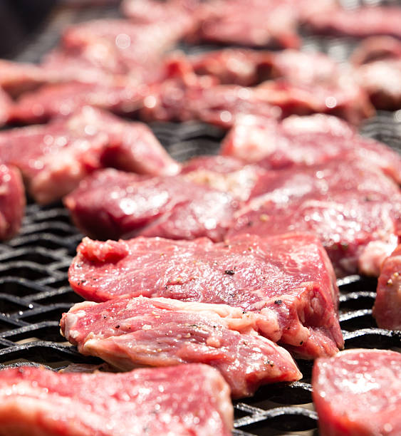 Beef Steaks on a home made barbecue stock photo