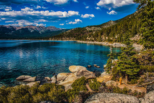 Beautiful Sand Harbor is located on the Northeast shore of Lake Tahoe within Lake Tahoe – Nevada State Park and has a large sandy beach, picnic benches and barbecues, a nature trail, two double boat ramps, and a visitors center which is open year-round. Sand Harbor Lake Tahoe receives over one million visitors annually.