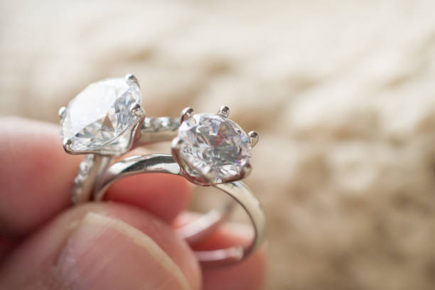 istock hand hold beautiful jewelry diamond ring 1361423538