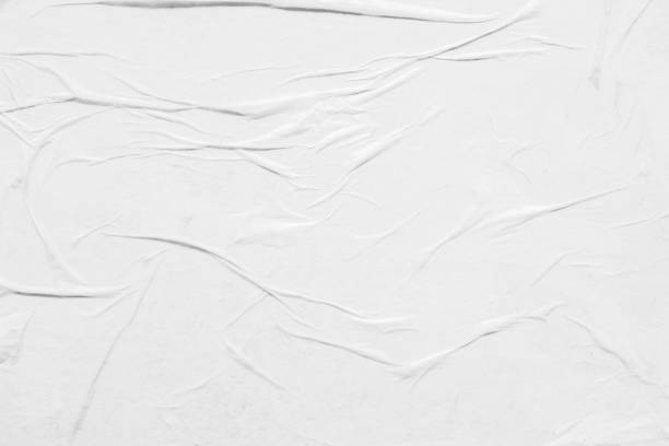 istock white crumpled and creased paper poster texture background 1361423540