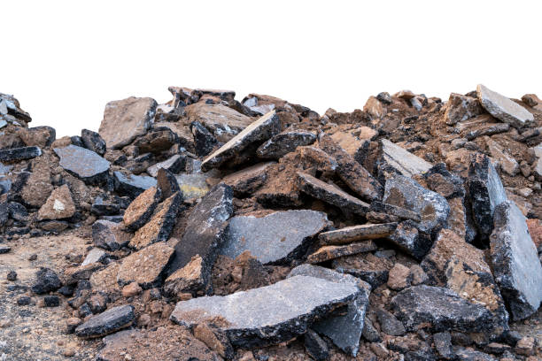 istock pile of broken asphalt pavement fragments destroyed on isolated white background 1361426399