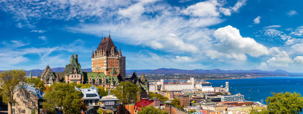 Frontenac Castle in Quebec City Panorama of Frontenac Castle (Fairmont Le Chateau Frontenac) in Old Quebec City, Canada chateau frontenac hotel stock pictures, royalty-free photos & images