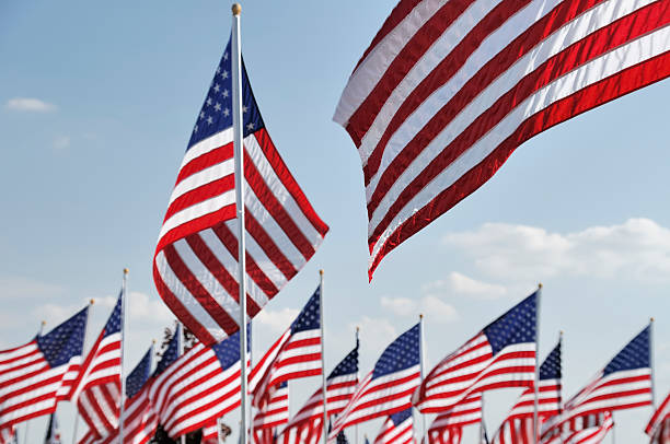 istock American Flags on Memorial Day  at a Cemetery 136143587