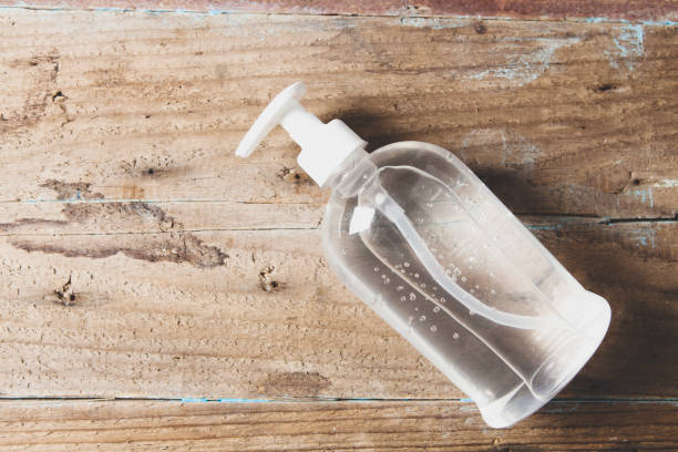 istock antiseptic on a wooden table 1361440410