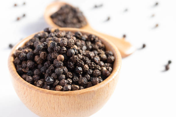 istock black pepper in a wooden cup 1361443633