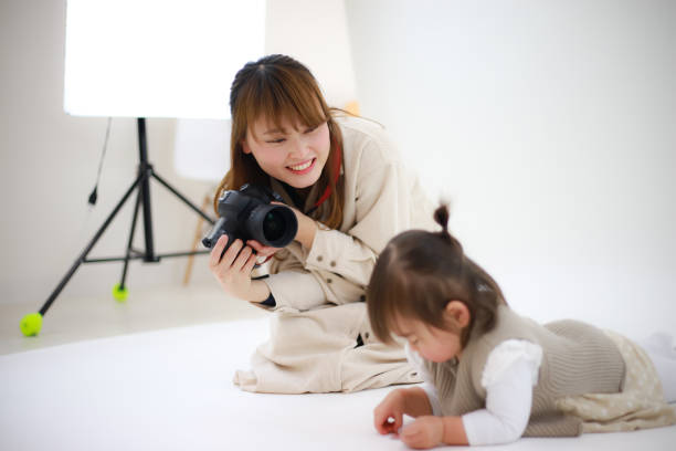 istock Smile female cameraman 1361448570