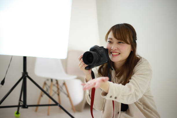 istock Smile female cameraman 1361448602