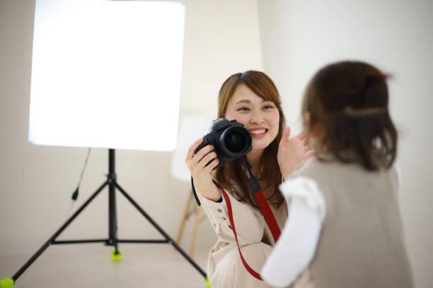 istock Smile female cameraman 1361448644