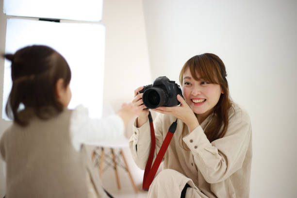 istock Smile female cameraman 1361448657