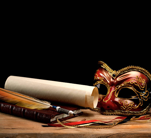 istock Still life containing quill parchment and mask 136144898
