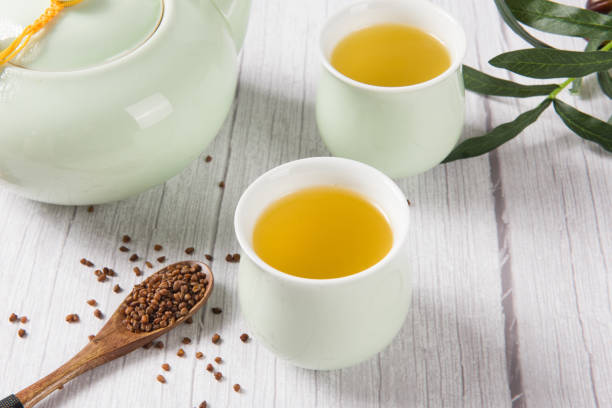 istock buckwheat tea in cup on  wood background. 1361453481