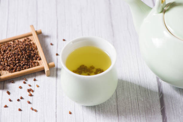 istock buckwheat tea in cup on  wood background. 1361454600