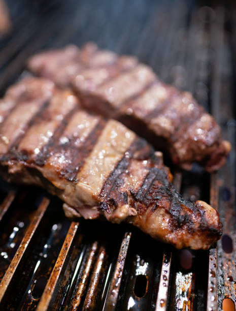 istock New York steak on the grill 1361455384