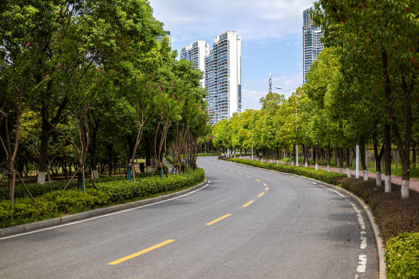 istock City road through modern buildings 1361456891