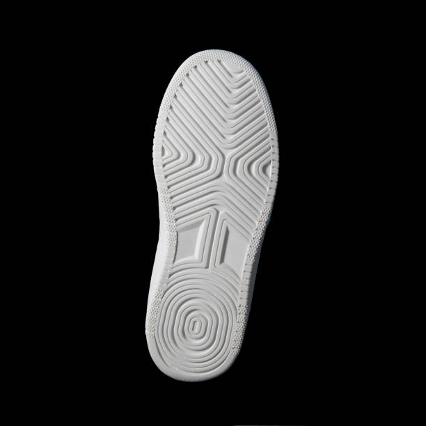 Sole of sports shoe. White. Frontally on a black background. Square format Sole of sports shoe. White. Frontally on a black background. Square format sole of shoe stock pictures, royalty-free photos & images