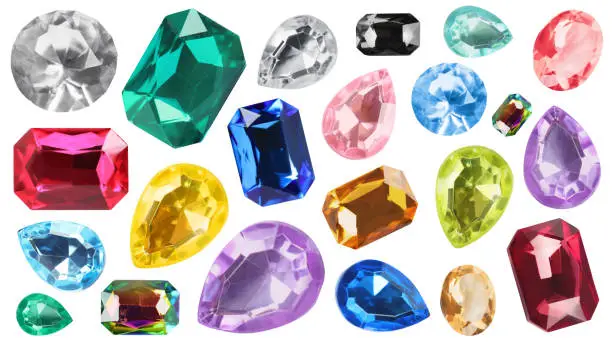 Photo of Set of bright gemstones isolated on white. Banner design
